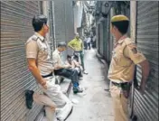  ??  ?? NIA officials during a raid in the Khari Baoli area of New Delhi on Saturday. RAVI CHOUDHARY/HT PHOTO