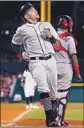  ?? Gregory Shamus Getty Images ?? DIXON MACHADO scores behind catcher Martin Maldonado.