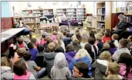  ?? LYNN KUTTER ENTERPRISE-LEADER ?? Rodgers leads story time at Farmington Public Library. Kindergart­en classes from Folsom and Williams elementary schools come to her Story Time each week, along with other children in the community.