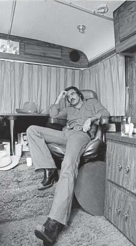  ?? Associated Press file ?? Burt Reynolds rests in his trailer on the set of “Smokey and the Bandit” in 1976 in Atlanta. Reynolds has died at age 82.