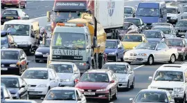  ??  ?? > Traffic piles up on the M6 approachin­g Birmingham