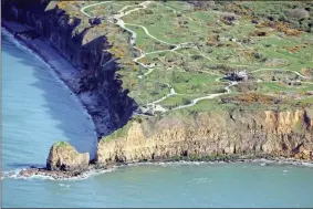  ??  ?? The “Pointe du Hoc” near Caen, Normandy, France, was the highest point during WWII between Utah Beach and Omaha Beach. The Germans fortified the area with concrete bunkers and gun pits. On D-Day (June 6, 1944) the United States Army successful­ly assaulted Point du Hoc after scaling the cliffs.