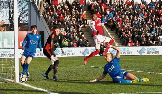  ??  ?? Almost!: Fleetwood’s Devante Cole (second from right) heading towards the Leicester goal during the English FA Cup third round match at Highbury Stadium yesterday. The match ended 0- 0. — Reuters