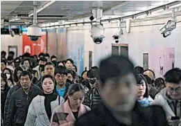  ?? ANDY WONG/AP ?? China’s “social credit” system is part of a government effort to use technology such as data processing, genetic sequencing and facial recognitio­n to tighten control.