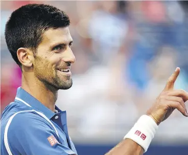  ?? NATHAN DENETTE / THE CANADIAN PRESS ?? Novak Djokovic is two wins away from hoisting the Rogers Cup trophy. He won the tournament in 2012 and 2011, as well as in 2007.