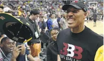  ?? ETHAN MILLER/GETTY IMAGES ?? LaVar Ball, father of Los Angeles Lakers first-round pick Lonzo Ball, is all business all the time when it comes to his basketball-playing sons, including lobbying for a US$1-billion sneaker deal.