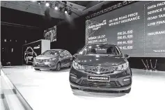  ?? — Bernama photo ?? File photo of Proton launching the Persona 2019 last month.