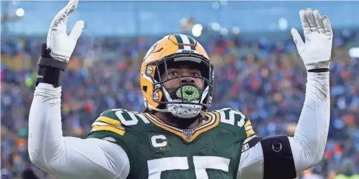  ?? GETTY IMAGES ?? Outside linebacker Za'Darius Smith celebrates after the Packers improved to 11-3 on Sunday.