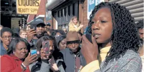  ??  ?? Amara Enyia holds a press conference with Chance the Rapper and Kanye West ( not pictured) in Southside Chicago in this still from the documentar­y series “City So Real,” part of the 43rd Denver Film Festival’s virtual lineup.
Provided by Denver Film