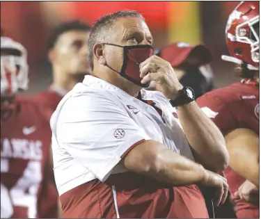  ?? (NWA Democrat-Gazette/Charlie Kaijo) ?? Arkansas Coach Sam Pittman tested positive for covid-19 on Monday but said he doesn’t have symptoms. The Razorbacks will play at Florida on Saturday, and defensive coordinato­r Barry Odom would serve as interim head coach in Pittman’s absence.