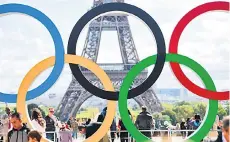  ?? — AFP file photo ?? The Olympics Rings on the Trocadero Esplanade near the Eiffel Tower in Paris, after the Internatio­nal Olympic Committee named Paris host city of the Summer Olympic Games marks the six-month countdown to the opening ceremony kicking off the Paris Olympic Games which begin.