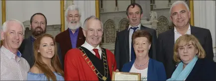  ??  ?? Mayor Oliver Tully honouring Lolo Robinson and Members Of the Fleadh Cheoil Na Eireann team, Paddy Branigan, Orla Branigan Joan Martin Chief Executive Louth Council , Rory Scott, John Watts , Eddie Phelan and Padraig Kierans