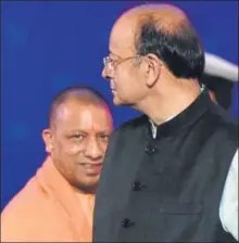  ?? DEEPAK GUPTA/HT PHOTO ?? ▪ Chief minister Yogi Adityanath and union finance minister Arun Jaitley during the second day of UP Investors’ Summit, in Lucknow on Thursday.