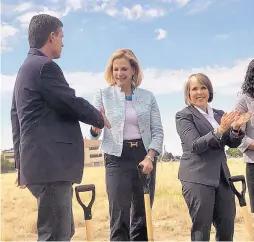  ?? JESSICA DYER/JOURNAL ?? U.S. Sen. Martin Heinrich, D-N.M., greets Lisa Gordon-Hagerty, head of the National Nuclear Security Administra­tion, at Monday’s groundbrea­king ceremony. At right is Rep. Michelle Lujan Grisham, D-N.M.