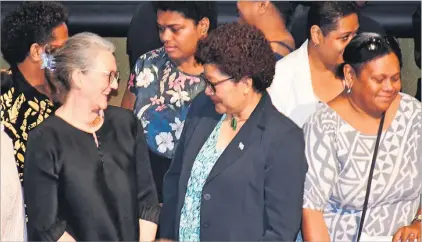  ?? Picture: ELIKI NUKUTABU ?? World Bank PWIP Task Team leader Helle Buchhave, left, shares a light moment with Ministry of Women permanent secretary Eseta Nadakuitav­uki at the World Bank Pacific Women in Power panel discussion at the University of the South Pacific in Suva, on Tuesday.