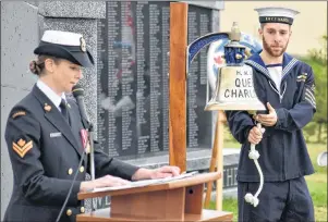  ?? DESIREE ANSTEY/ JOURNAL PIONEER ?? Master Seaman Rachel McCarthy, left, and Ordinary Seaman Clark Upton take part in a ceremony commemorat­ing the 73rd anniversar­y of the Battle of the Atlantic in Kensington on Sunday. McCarthy has served for 13 years and Upton 11 months.