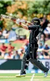  ?? PHOTOSPORT ?? Tom Latham launches into a delivery at Hagley Oval.