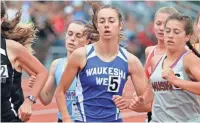  ?? RICK WOOD / MILWAUKEE JOURNAL SENTINEL ?? Waukesha West’s Becca Langer finishes third in the 1,600. West won the team title despite claiming just one race.