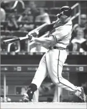  ?? LYNNE SLADKY / The Associated Press ?? Atlanta’s Ender Inciarte connects for one of his two homers on Wednesday vs. Miami.