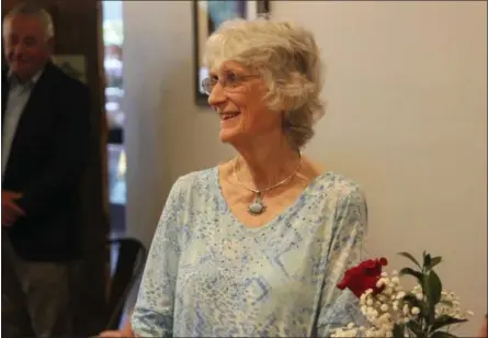  ?? CHARLES PRITCHARD - ONEIDA DAILY DISPATCH ?? Paula Bishop smiles as she receives a round of applause from the Oneida Rotary after receiving the Roses to the Living Award on Tuesday, July 1, 2019.