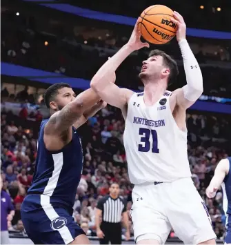  ?? AP ?? Robbie Beran, shooting against Penn State’s Myles Dread, had nine points and seven rebounds Friday.