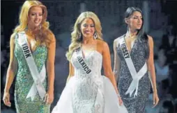  ?? AP ?? Miss New Jersey Chhavi Verg (right) competes during a preliminar­y competitio­n for Miss USA in Las Vegas. Verg had emigrated from India with her parents and is among the five foreignbor­n contestant­s vying for the Miss USA title this year.