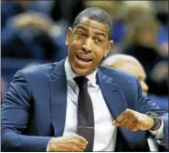  ?? THE ASSOCIATED PRESS FILE PHOTO ?? UConn head coach Kevin Ollie reacts during the first half of an NCAA college basketball game against Cincinnati in Storrs, Conn., Sunday, March 5, 2017.