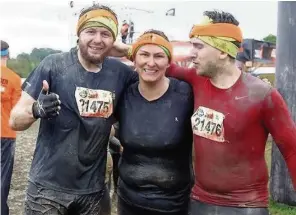  ??  ?? Mad mudders George Paterson, Julie Lowe and Myles Leggatt