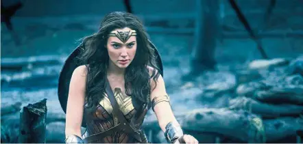  ?? — Warner Bros ?? Wonder Woman, starring Gadot, is a rarity – it earned positive reviews and became a major hit at the box office.
