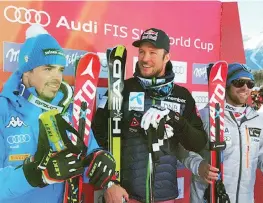  ??  ?? Fill soddisfatt­o sul podio con il vincitore Aksel Lund Svindal, 32 anni e Travis Ganong, 27