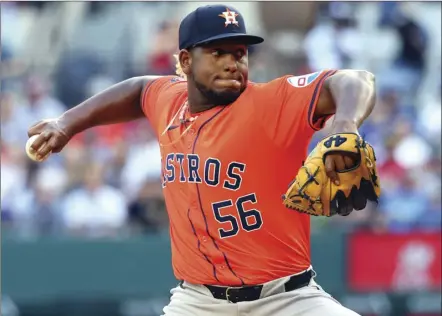  ?? AP photo ?? Houston pitcher Ronel Blanco delivers in the second inning against Texas in the first inning of a game on Sunday in Arlington, Texas.