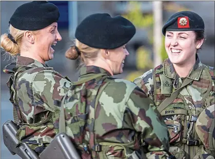  ?? ?? Service: The overwhelmi­ng majority of army recruits are male, but women are more likely to get through training