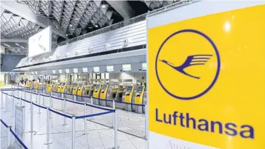  ?? DPA/AFP ?? Deserted check-in desks of German airline Lufthansa are seen at the Frankfurt am Main Airport yesterday.