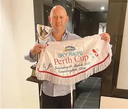  ?? ?? Grant Pask with the spoils of Vice Grip’s Perth Cup victory
