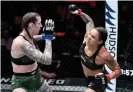  ?? Photograph: Jeff Bottari/Zuffa LLC ?? Brazil’s Amanda Nunes punches Megan Anderson of Australia during their UFC women’s featherwei­ght championsh­ip fight on Saturday in Las Vegas.