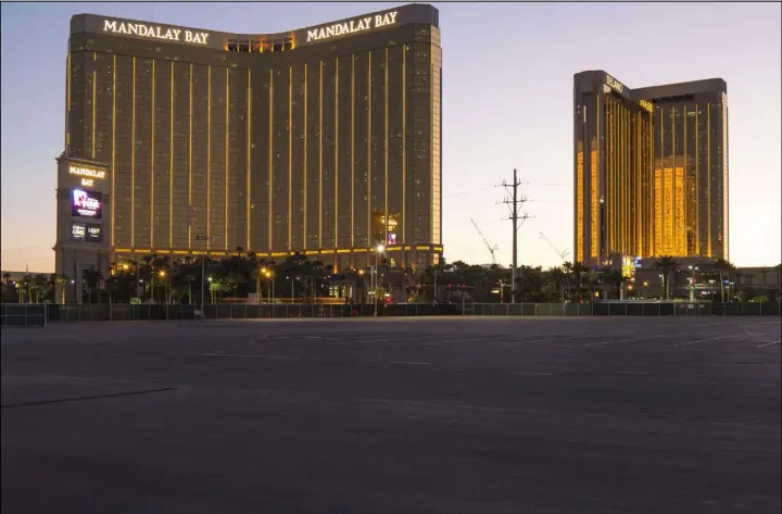  ?? Richard Brian Las Vegas Review-Journal @vegasphoto­graph ?? Mandalay Bay and Delano Las Vegas are seen Tuesday from the Las Vegas Village grounds, the future of which remains unclear a year after the Route 91 massacre.