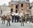  ??  ?? Arrested civilians are marched to detention by British troops on Bloody Sunday