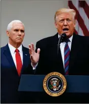  ?? AP PHOTO/MANUEL BALCE CENETA ?? PRESIDENT DONALD TRUMP, with Vice President Mike Pence, speaks during a news conference in the Rose Garden of the White House after meeting with lawmakers about border security Friday in Washington.