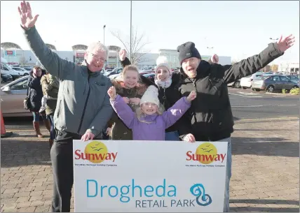  ??  ?? Bernard McCann of 1Plus Events with the very excited Connor family from Liscorrie in Drogheda who won a family trip to Lapland this Christmas with Sunway Holidays and Drogheda Retail Park