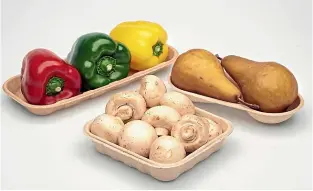  ??  ?? Clear plastic, left, protects fragile products such as fruit and lets consumers see what they’re getting. But Jenkins Freshpac Systems in Tauranga is working on alternativ­es, including fibre-based fruit and vege trays.