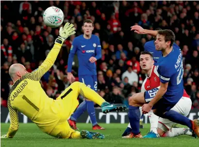  ?? Reuters ?? Arsenal’s Granit Xhaka scores a winner against Chelsea during the Carabao Cup semifinal at the Emirates Stadium. —