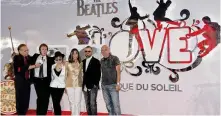  ?? AP ?? From left: Larry King, Paul Mccartney, Yoko Ono Lennon, Olivia Harrison, Ringo Starr and Guy Laliberte during the first anniversar­y of “The Beatles Love” at the Mirage in Las Vegas on June 26, 2007.