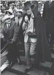  ?? THE CANADIAN PRESS FILE PHOTO ?? Prime Minister Pierre Trudeau walks down the grandstand steps to present the Grey Cup trophy to the Montreal Alouettes in 1970.