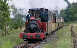  ?? CHRIS PARRY ?? ‘Quarry Hunslet’ 0-4-0ST George B returns to Llanuwchll­yn with an empty stock working on July 9, the day the Bala Lake Railway became the first Welsh line to reopen to the public. Note the obligatory face masks.