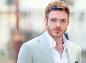  ?? GETTY IMAGES ?? Richard Madden, shown in a 2015 photo, turned heads as the prince in the movie “Cinderella” and Robb Stark in HBO’s “Game of Thrones.”