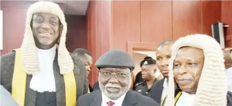  ?? ?? President, Nigerian Bar Associatio­n ( NBA), Yakubu Maikyau ( left); Chief Justice of Nigeria ( CJN), Kayode Ariwoola and Minister for Justice, Lateef Fagbemi, during a special valedictor­y court session in honour of former governor of Ondo State, the late Oluwarotim­i Akeredolu, at the Oyo State High Court in Ibadan… yesterday.