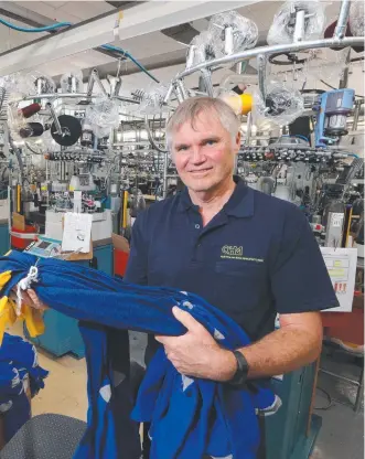  ?? Picture: GLENN HAMPSON ?? Queensland Hosiery Mill’s Jim Smith at the Carrara factory.