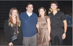  ?? (NWA Democrat-Gazette/Carin Schoppmeye­r) ?? Audre Darling, Jackson L. Graves Foundation executive director (from left), James and Angie Graves and Charlie Graves welcome supporters to the 14th annual Ooh! La, la! benefit.