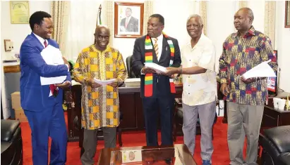  ??  ?? President Mnangagwa receives the first draft of The Africa Factbook, a much-awaited publicatio­n which seeks to change global per - ceptions about Africa from the Institute of African Knowledge chairperso­n Ambassador Simbi Mubako (second from right) while board members Pritchard Zhou (right), Baffour Ankomah (second from left) and CEO Kwame Tapiwa Muzawazi look on in Harare last Friday