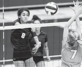  ?? Photos by Tom Reel / Staff photograph­er ?? Senior outside hitter Kali Nelson drills one of her match-high 21 kills in No. 3 O’Connor’s 25-15, 25-14, 26-24 win over No. 9 Harlan at Taylor Field House.